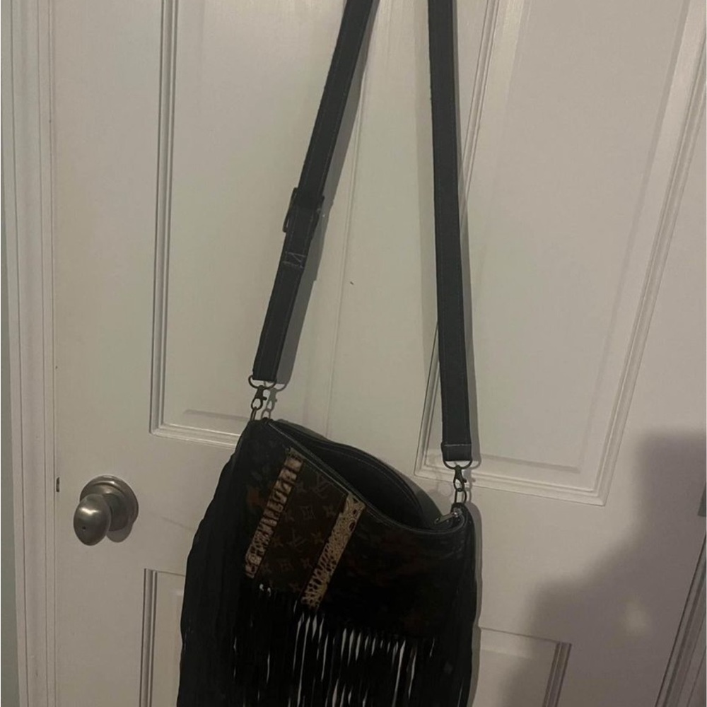 Fringe cowhide purse